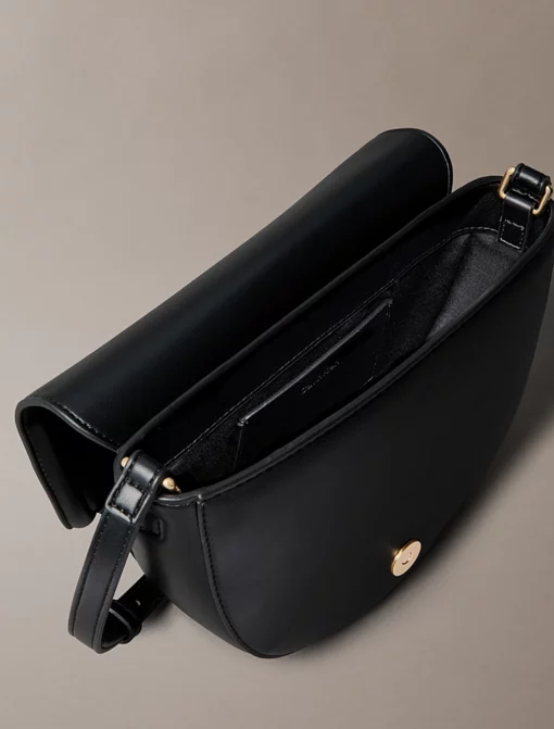 Calvin Klein Embossed Monogram Logo Saddle Bag Black