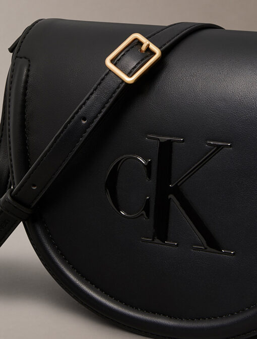 Calvin Klein Embossed Monogram Logo Saddle Bag Black